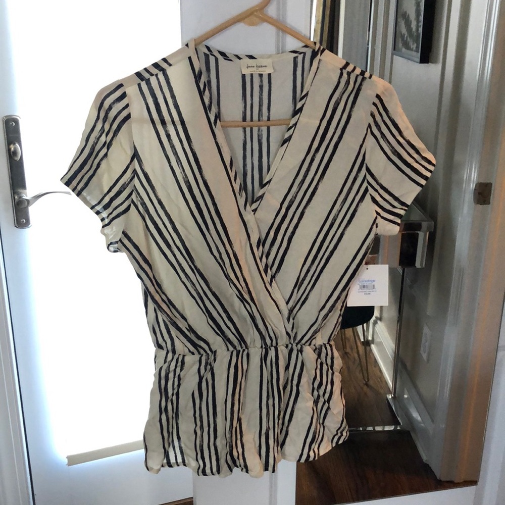Black and white striped blouse.